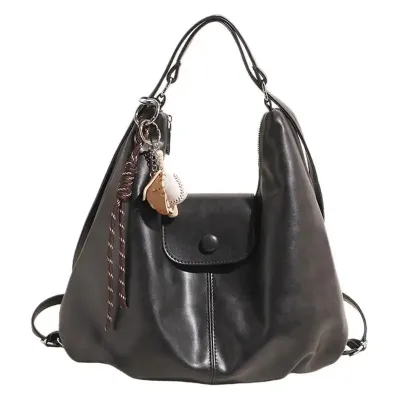 RADIANT EMBRACE HANDBAG